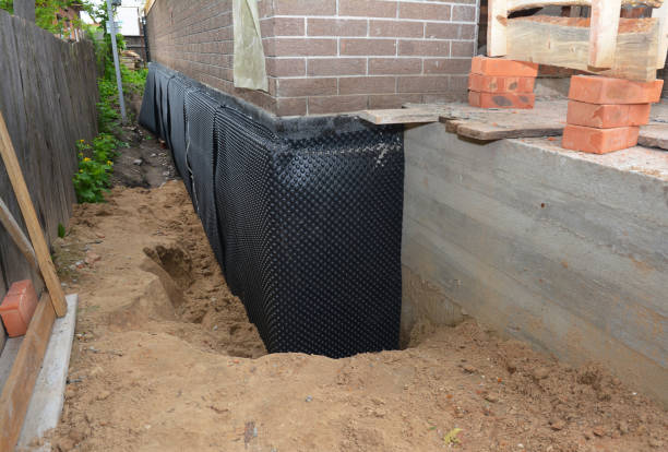 Happy homeowners after waterproofing job in Sevierville